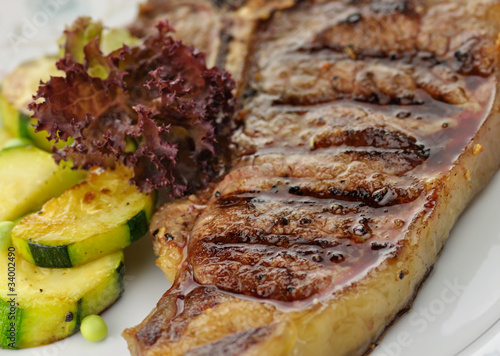 Photo: barbecue T Bone steak close up barbecue T Bone steak close up