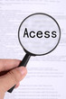 Magnifier glass in hand