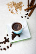 Photo en ligne au meilleur prix Cup of coffee with cinnamon and peanuts