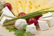 Various types of cheese on a wooden board Various types of cheese on a wooden board