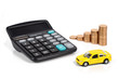 Calculator,coins and toy car Calculator,coins and toy car