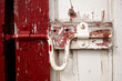 Photo: Old painted lock on the barn doors. Old painted lock on the barn doors.