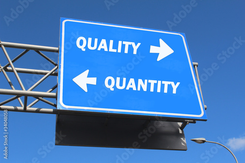 Photo: Highway sign - Quality vs. Quantity Highway sign - Quality vs. Quantity