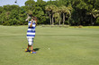 young boy golfing young boy golfing
