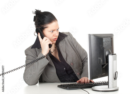 Foto: calling fat businesswoman working on computer, series calling fat businesswoman working on computer, series