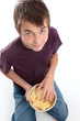 Photo: Boy eating potato chips Boy eating potato chips