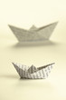 Two paper boats