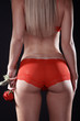 Foto: Sexy Hintern einer Frau mit roter Rose, hoch Sexy Hintern einer Frau mit roter Rose, hoch