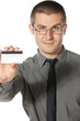 Young business man showing credit card