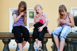 Teenage girls calling on the mobile phones