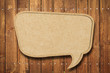 Blank Speech Bubble on wood background