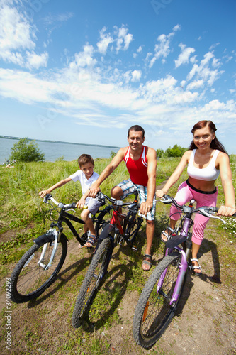 Photo: Family of bicyclists Family of bicyclists
