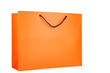 Bright orange paper shopping bag isolated on a white background Bright orange paper shopping bag isolated on a white background