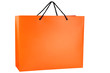 Bright isolated orange shopping bag with black handles lifted. Bright isolated orange shopping bag with black handles lifted.