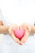 Photo: a nurse holding a symbol of heart a nurse holding a symbol of heart