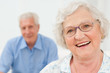 Smiling senior lady with husband