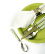 Place setting in green with white napkin Place setting in green with white napkin