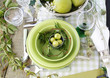 Summer table setting with green dinnerware Summer table setting with green dinnerware