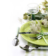 Summer table setting with green dinnerware Summer table setting with green dinnerware