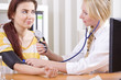 doctor measuring blood pressure