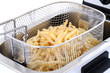Freshly baked french fries in an electric frying pan basket