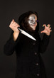 Two-faced witch with knife crinkled