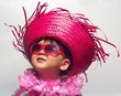 tourist girl with funny tropical hat, on gray background