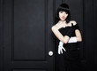Fashion portrait of young beautiful woman in the black dress Fashion portrait of young beautiful woman in the black dress