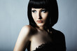 Fashion portrait of a young beautiful dark-haired woman Fashion portrait of a young beautiful dark-haired woman