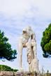 Beautiful statue of marble man without head in the park Beautiful statue of marble man without head in the park