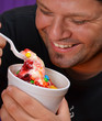 Man Looking at Frozen Yogurt