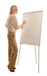 Woman in glasses standing in front of drawing board