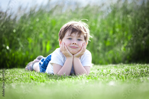 Photo: Girl lying in field Girl lying in field