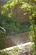 Water splashing from pipe in a garden
