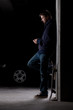 Photo: Man standing with skateboard Man standing with skateboard