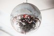 Low angle view of a mirrored disco ball in a nightclub
