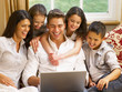 Photo: Hispanic family shopping online Hispanic family shopping online