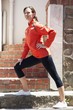 Beautiful young woman exercising