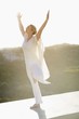Mid adult woman practicing yoga
