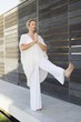 Mid adult woman practicing yoga