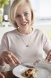 Woman having food