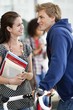 Man and woman having a discussion and smiling