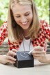 Foto: Woman making a heart shape on a model home Woman making a heart shape on a model home