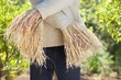 Mid section view of a man as scarecrow