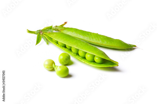 Photo: green peas isolated on white green peas isolated on white
