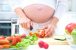 Pregnant woman cooking