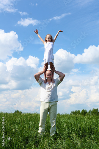 Photo: father with daughter in summer day outdoors father with daughter in summer day outdoors