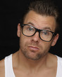 Photo: Expressive man with glasses Expressive man with glasses