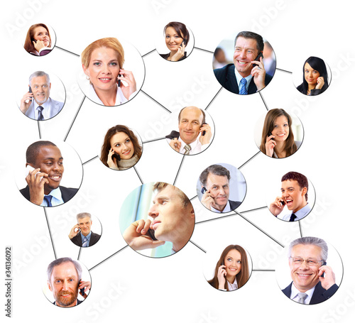 Photo: A group of people talking on the phone A group of people talking on the phone