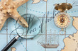 magnifier and compass on  map